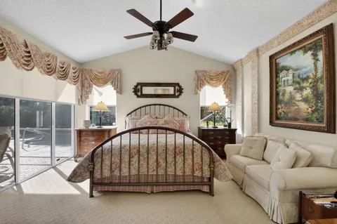 a bathroom with a sink a toilet and shower curtain