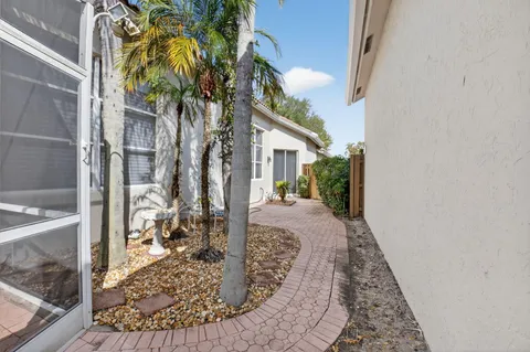 a kitchen with a table and chairs in it