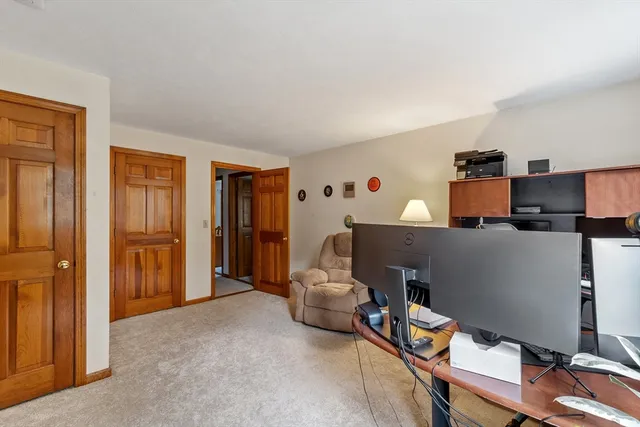 a room with furniture and a window