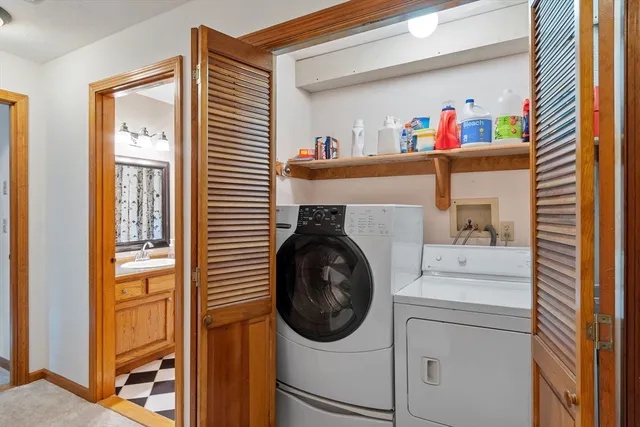 a utility room with dryer and washer