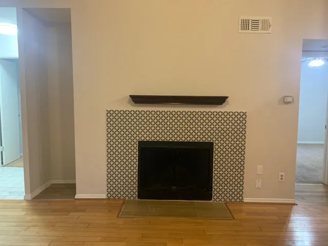 a living room with a fireplace