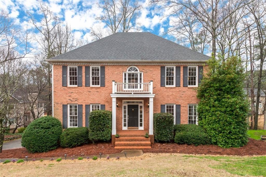 FALL IN LOVE WITH THIS TRADITIONAL 3 BEDROOM, 2.5 BATHROOM BRICK BEAUTY IN WEST COBB
