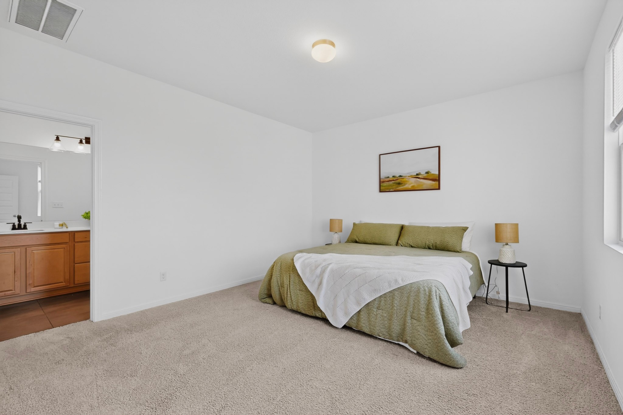 2524 Acoma Lane Leander, TX 78641 - Photo 12 of 27 a bedroom with a bed and a couch