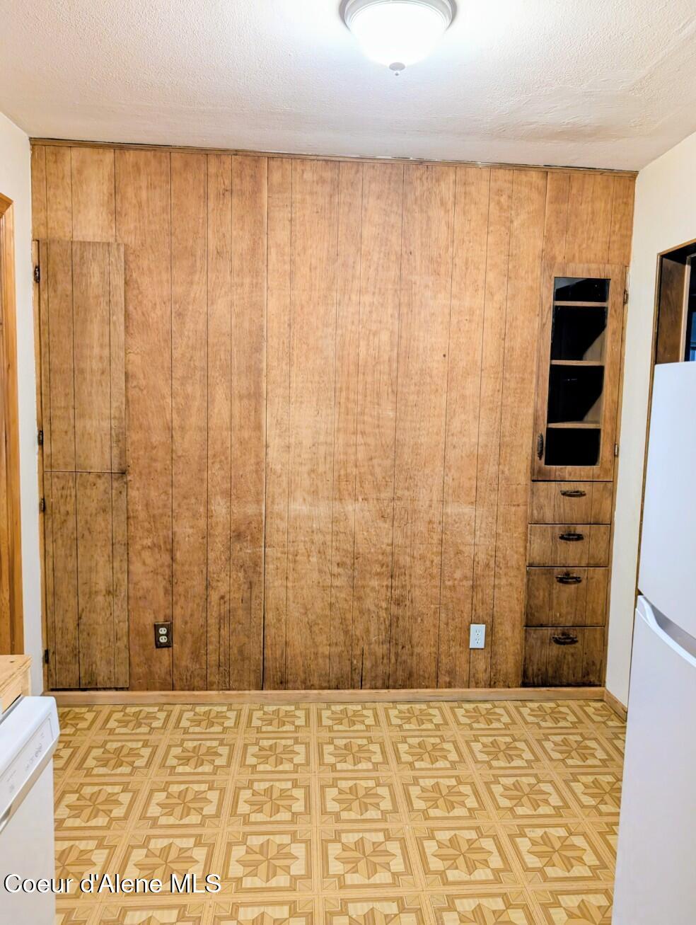 6873 Hill Side Alley Bonners Ferry, ID 83805 - Photo 11 of 27 Built ins in the kitchen