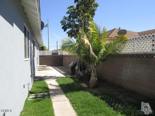 a view of yard from a corridor