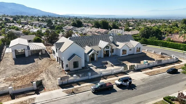 an aerial view of a house with a garden