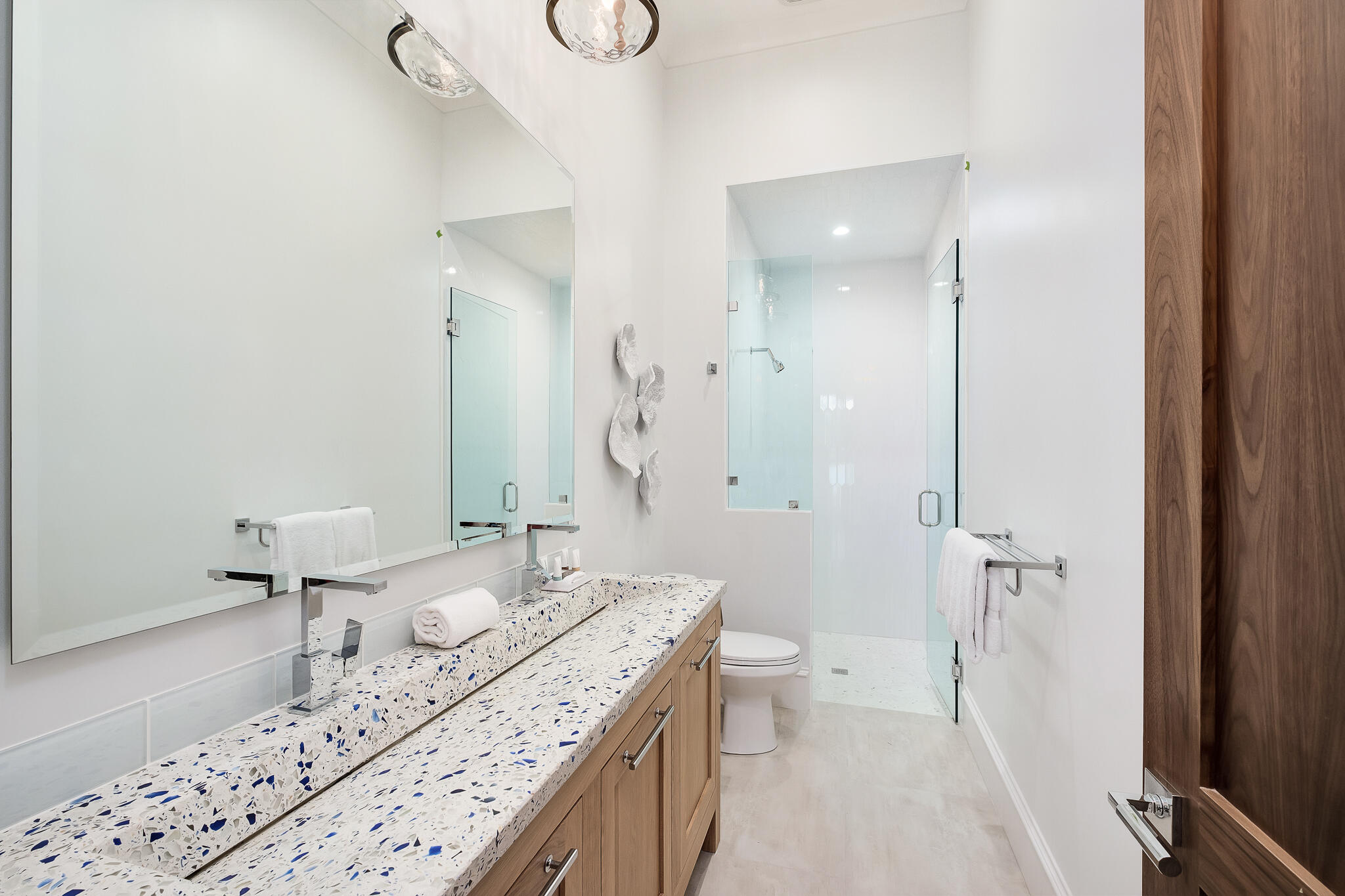 24 Brenda Ln Inlet Beach Inlet Beach, FL 32461 - Photo 15 of 55 a bathroom with a granite countertop sink a toilet and shower