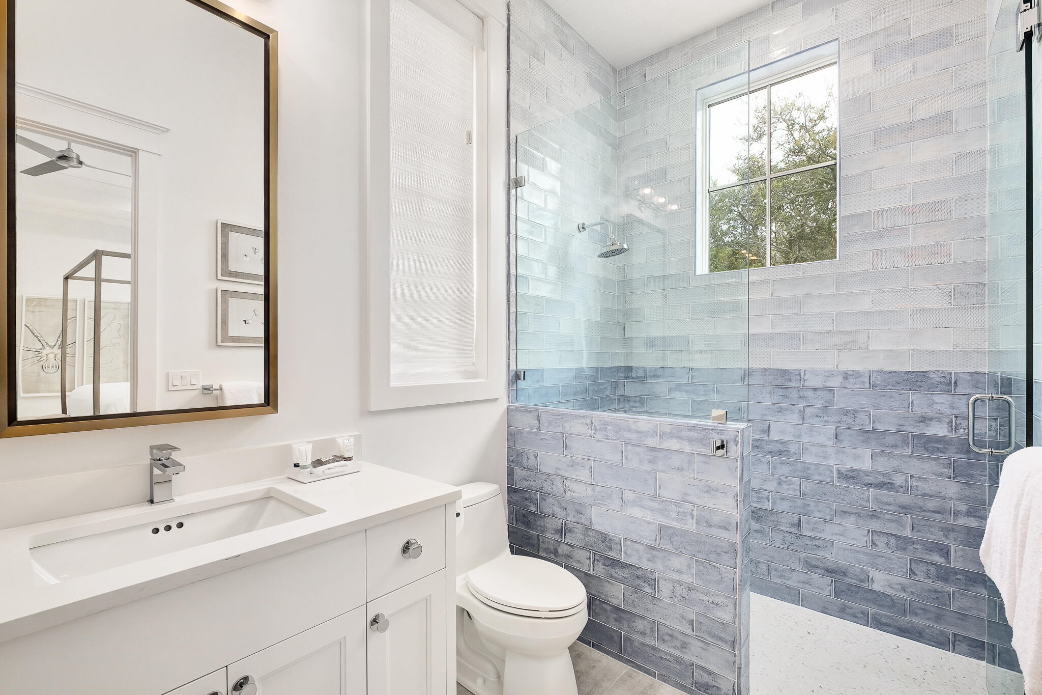 24 Brenda Ln Inlet Beach Inlet Beach, FL 32461 - Photo 17 of 55 a bathroom with a double vanity sink toilet and a mirror