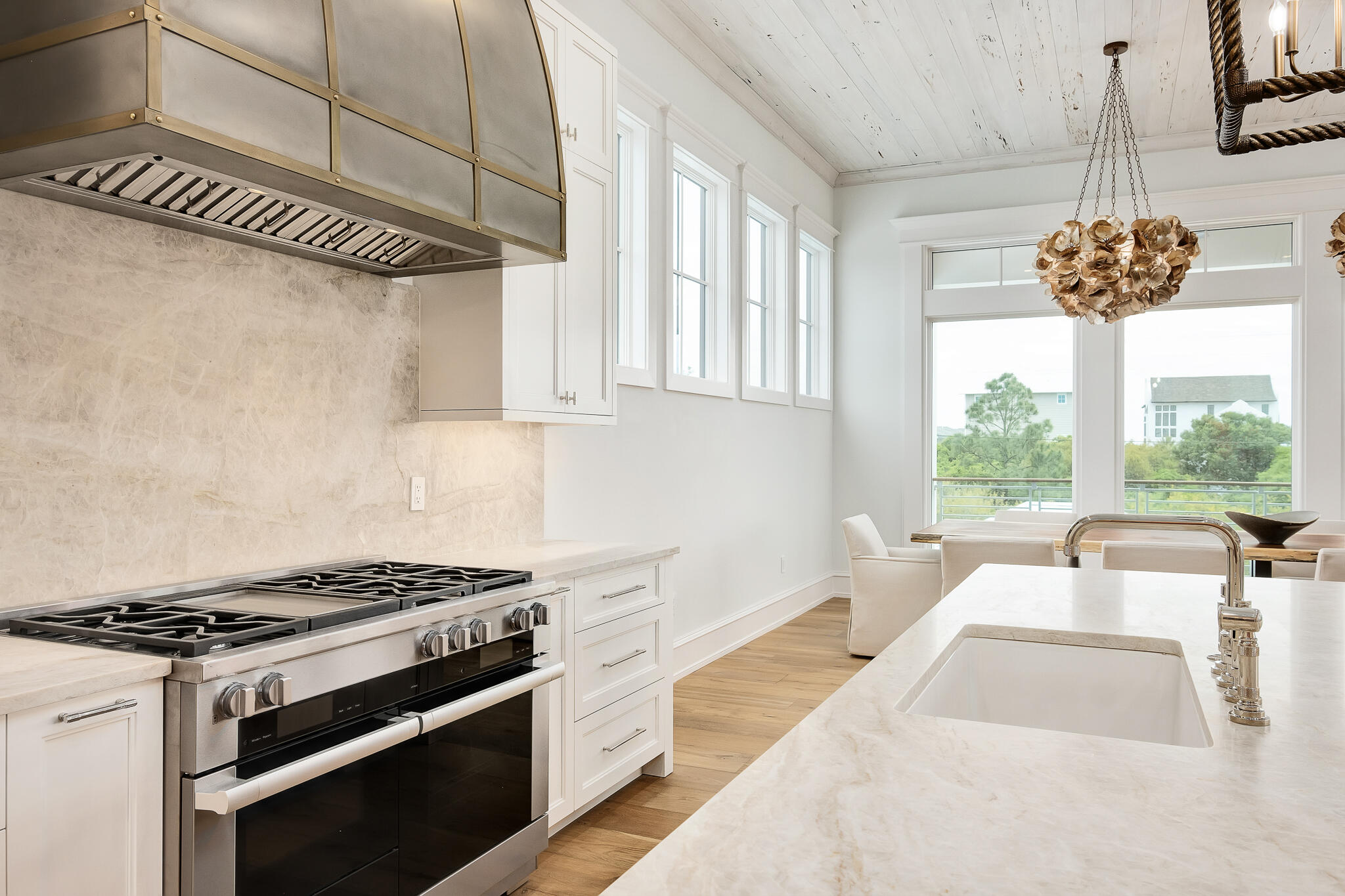 24 Brenda Ln Inlet Beach Inlet Beach, FL 32461 - Photo 25 of 55 a kitchen with stainless steel appliances granite countertop a stove and a wooden floors