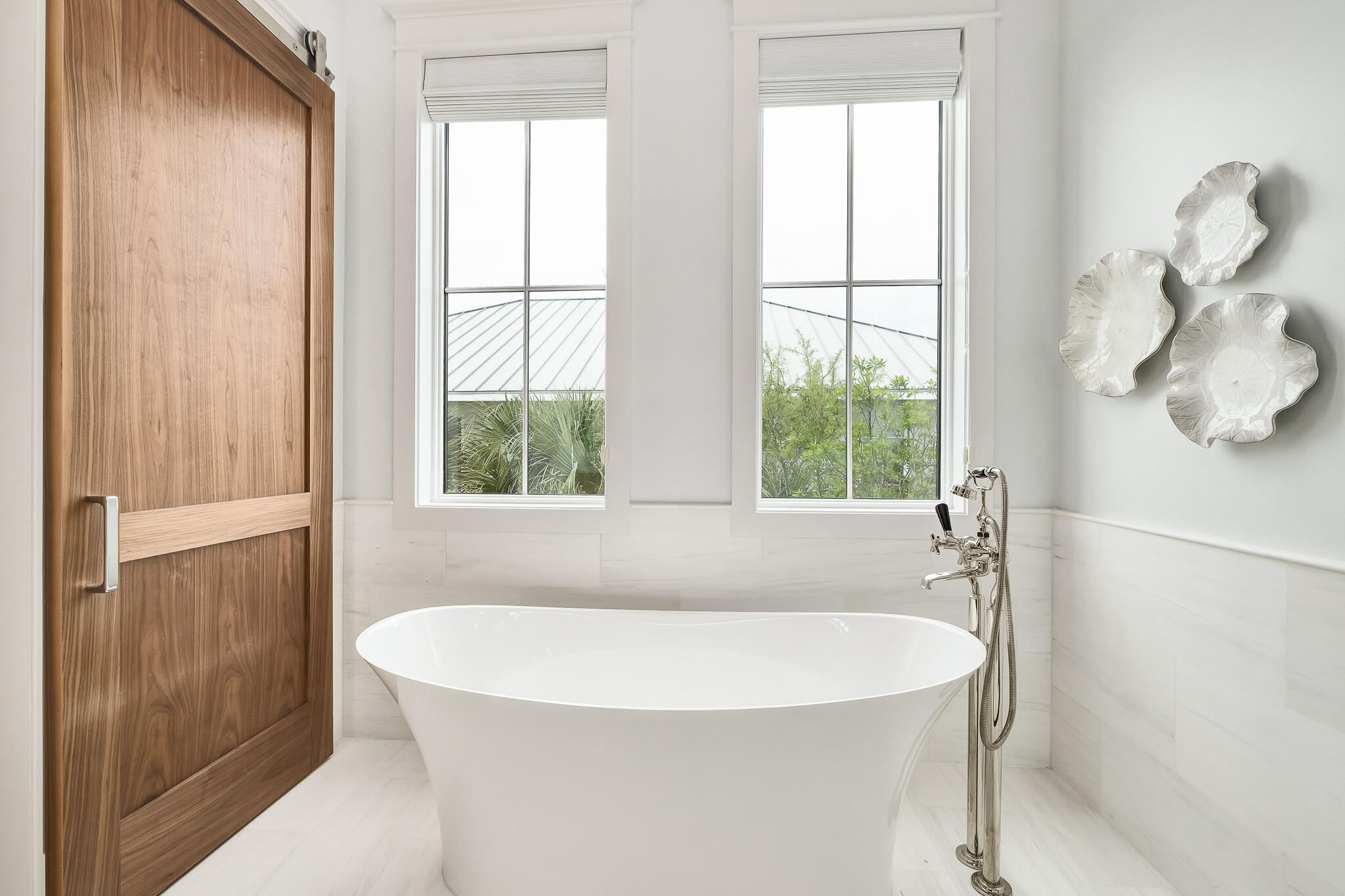 24 Brenda Ln Inlet Beach Inlet Beach, FL 32461 - Photo 31 of 55 a white bath tub sitting in a bathroom next to a window