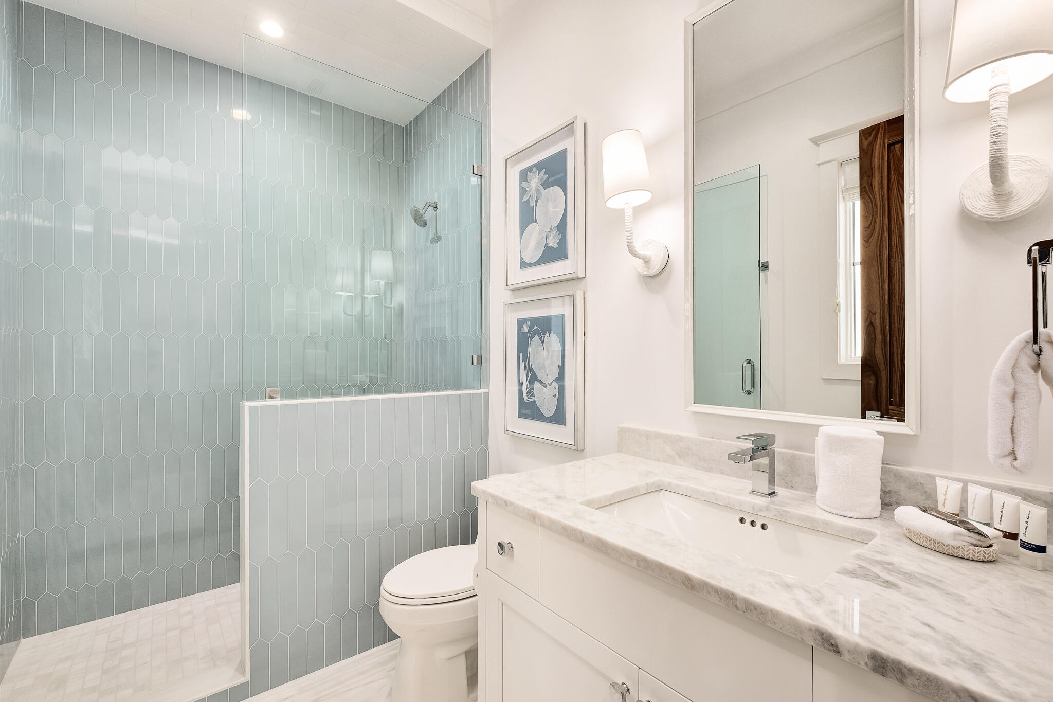 24 Brenda Ln Inlet Beach Inlet Beach, FL 32461 - Photo 41 of 55 a bathroom with a granite countertop sink mirror vanity and toilet