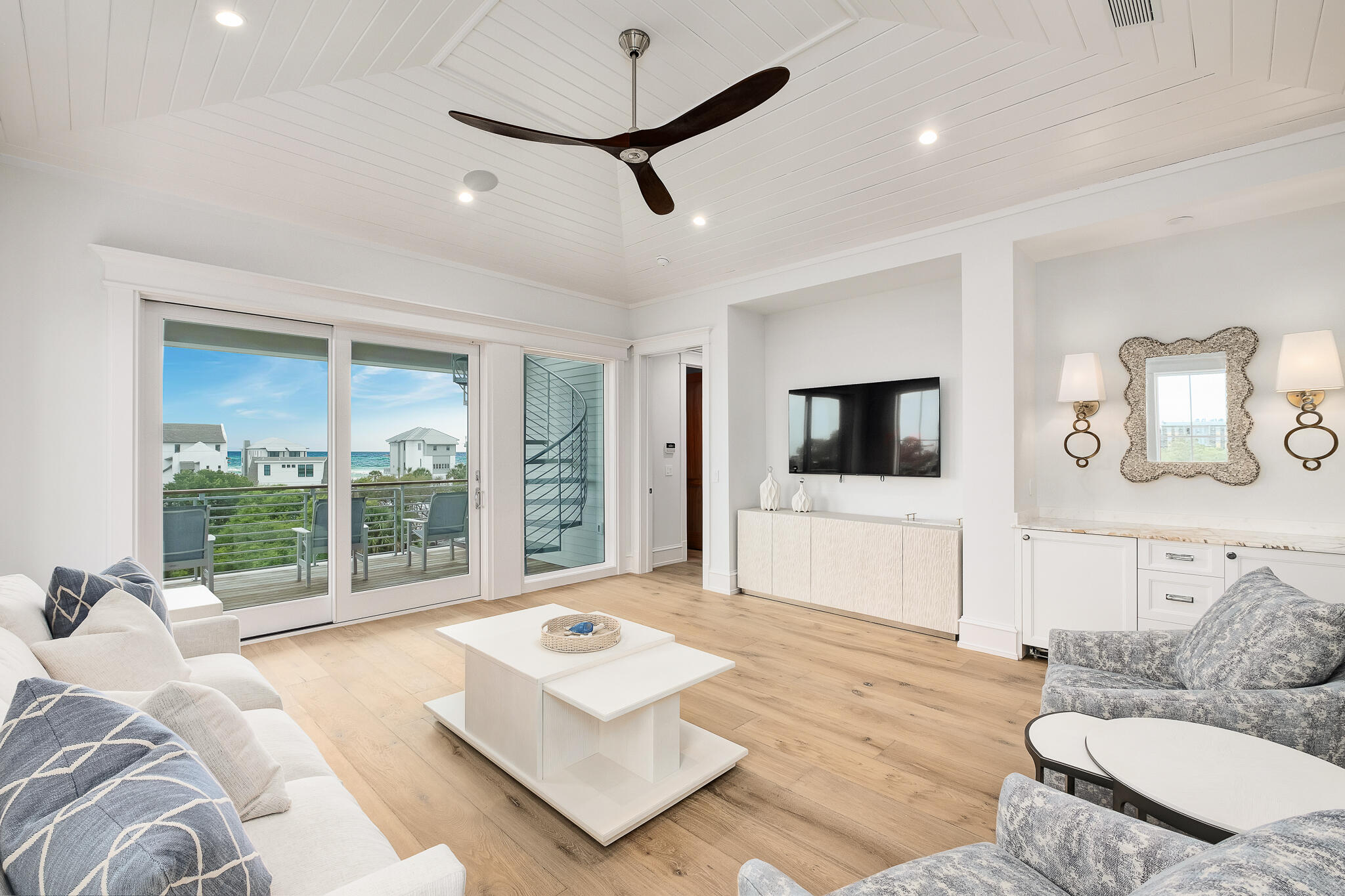 24 Brenda Ln Inlet Beach Inlet Beach, FL 32461 - Photo 43 of 55 a living room with furniture a flat screen tv and a large window