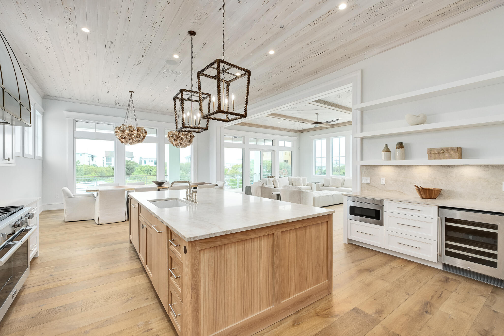 24 Brenda Ln Inlet Beach Inlet Beach, FL 32461 - Photo 5 of 55 a kitchen with kitchen island a large counter top space a sink stainless steel appliances and windows