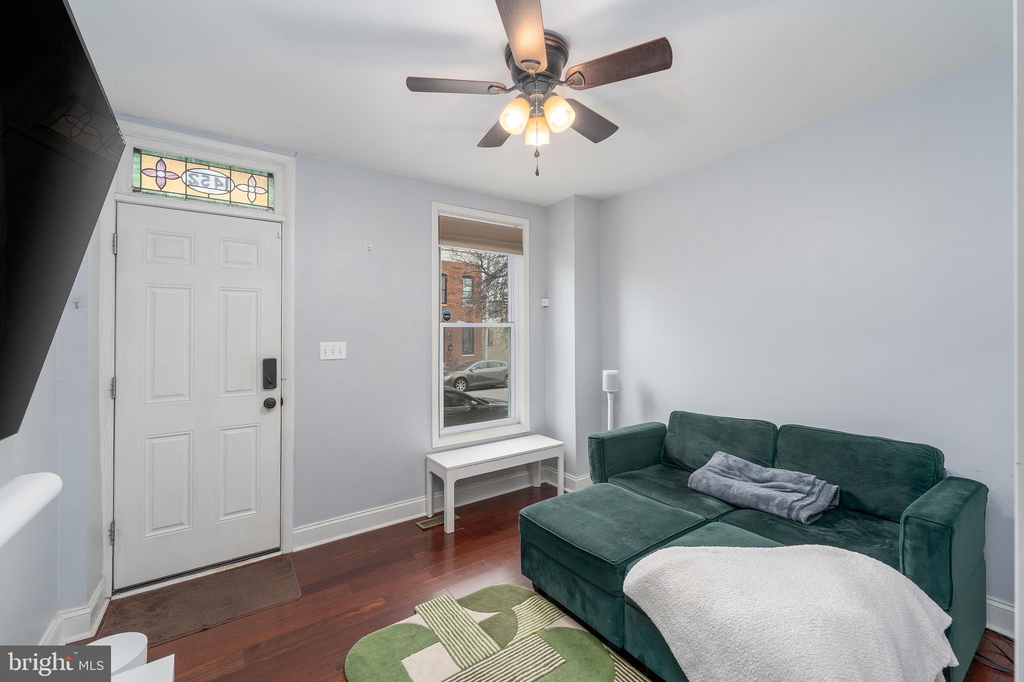 1452 Decatur Street Baltimore, MD 21230 - Photo 5 of 34 Living room with front entrance view