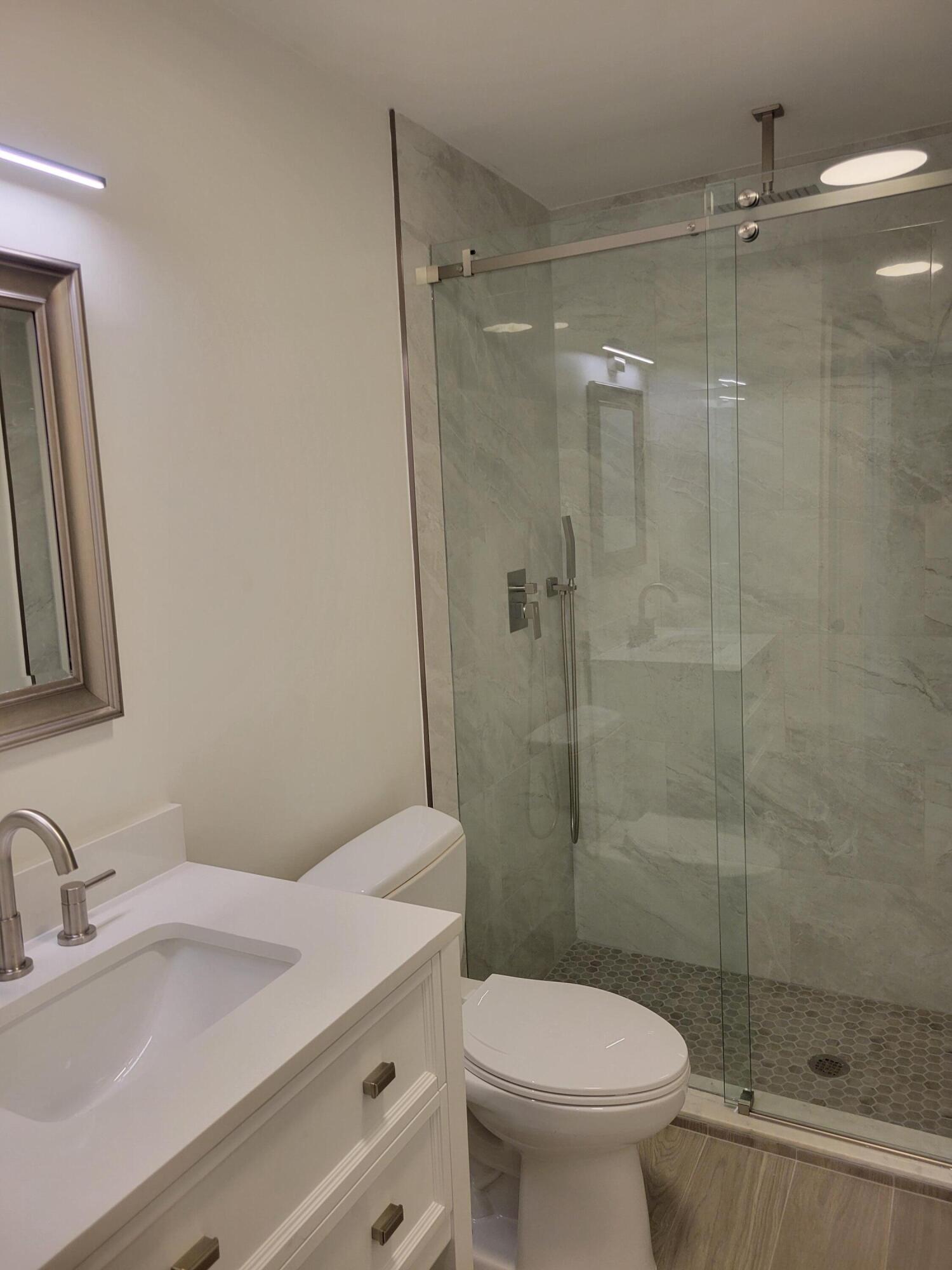 Undisclosed Address Boca Raton, FL 33432 - Photo 16 of 23 28_Bath-III01