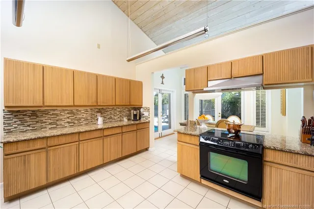 a view of a swimming pool with lounge chair