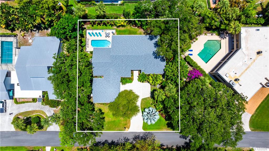 8 Kingston Court Stuart, FL 34996 - Photo 7 of 51 an aerial view of house with a yard and swimming pool