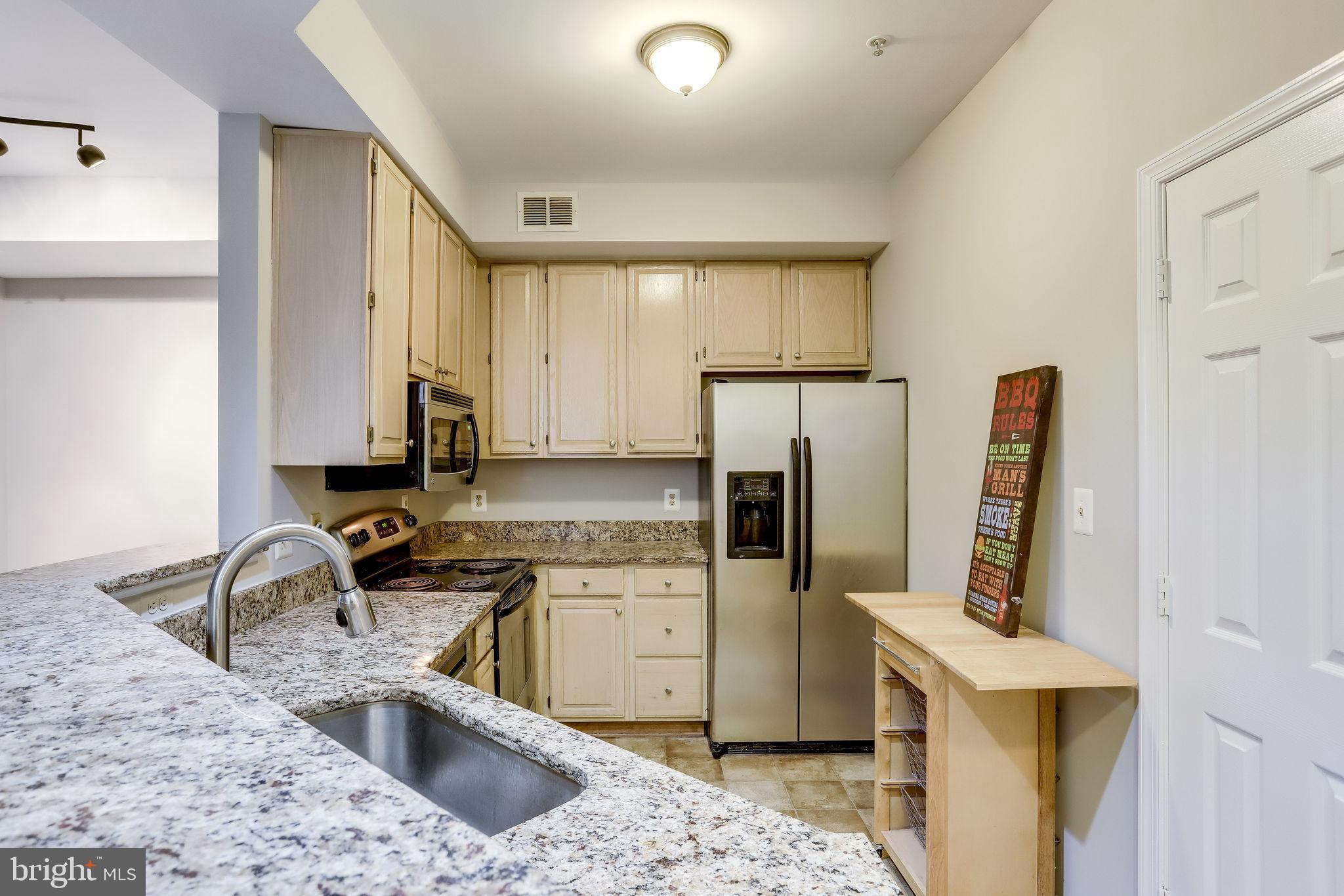 1357 Garden Wall Circle, Unit 708 Reston, VA 20194 - Photo 15 of 39 Granite countertops