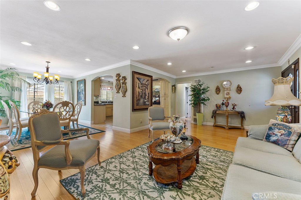5441 North Calera Avenue Covina, CA 91722 - Photo 12 of 32 a living room with furniture and a potted plant