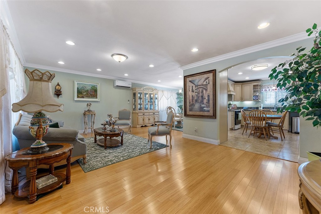5441 North Calera Avenue Covina, CA 91722 - Photo 13 of 32 a living room with furniture and wooden floor