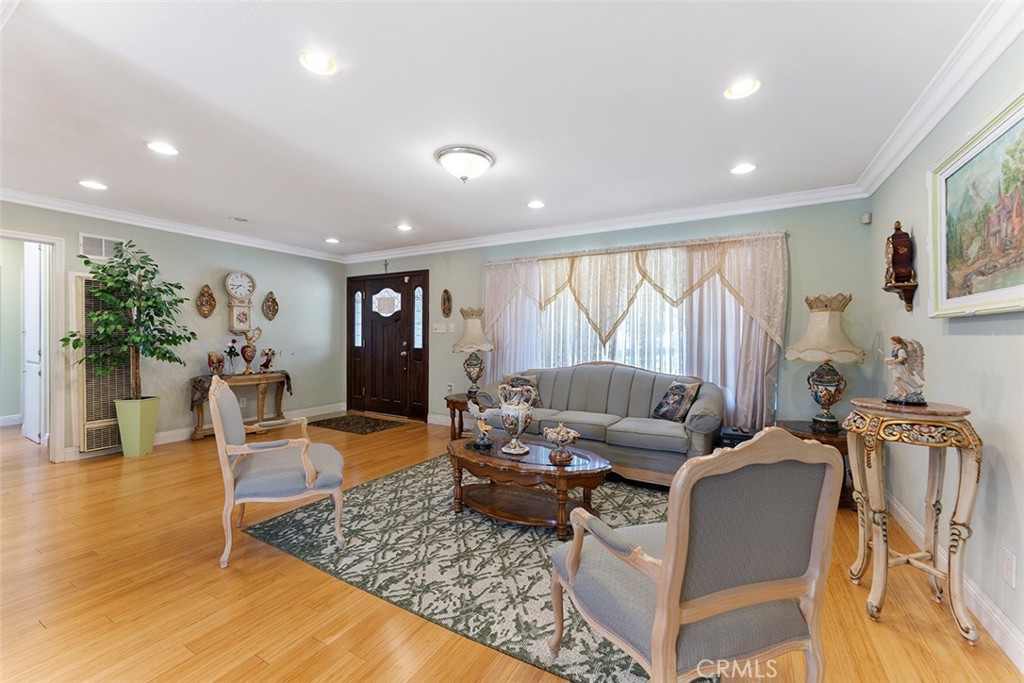 5441 North Calera Avenue Covina, CA 91722 - Photo 17 of 32 a living room with furniture and wooden floor