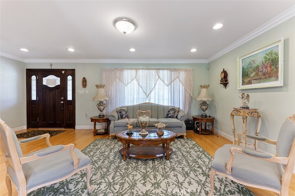 5441 North Calera Avenue Covina, CA 91722 - Photo 18 of 32 a living room with furniture and a large window
