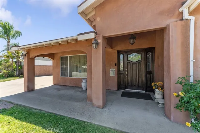 a front view of a house with a porch