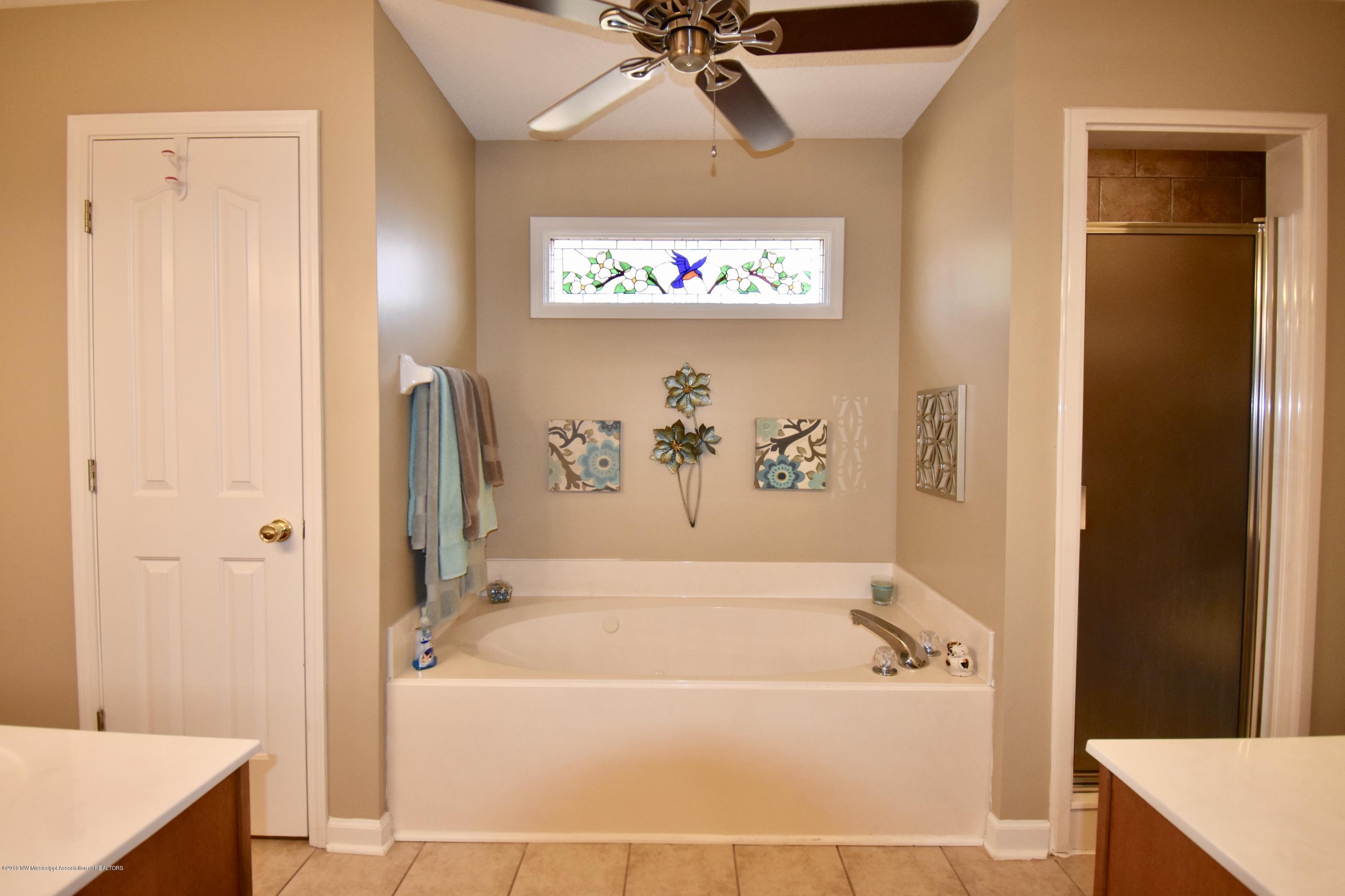 8980 Bell Ridge Drive Olive Branch, MS 38654 - Photo 15 of 31 Whirlpool tub - walk in tile shower