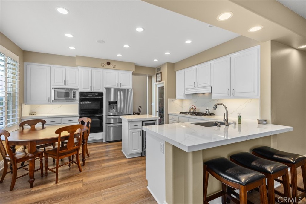 71 Golf Ridge Drive Rancho Santa Margarita, CA 92679 - Photo 8 of 49 Kitchen Opens to Family Room