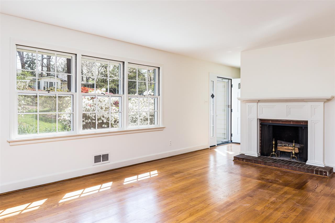 1808 Manuel Street Raleigh, NC 27612 - Photo 4 of 29 Living Room with Wood Burning Fireplace