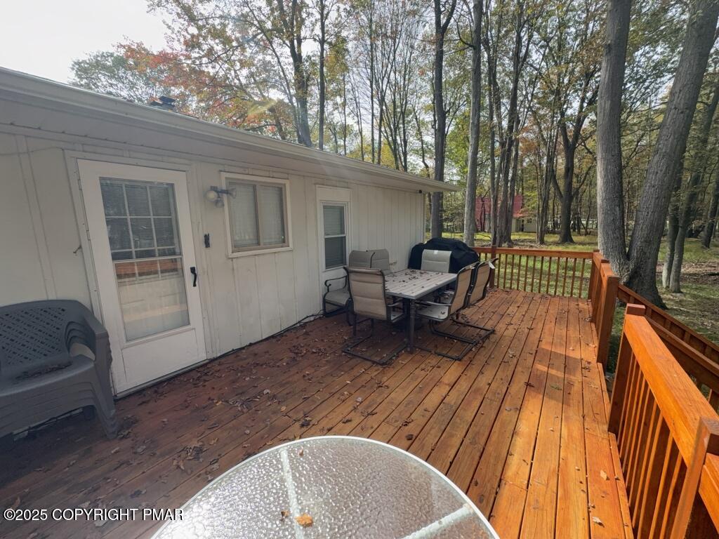 5228 Hummingbird Drive Pocono Summit, PA 18346 - Photo 26 of 28 a view of outdoor space yard deck and patio