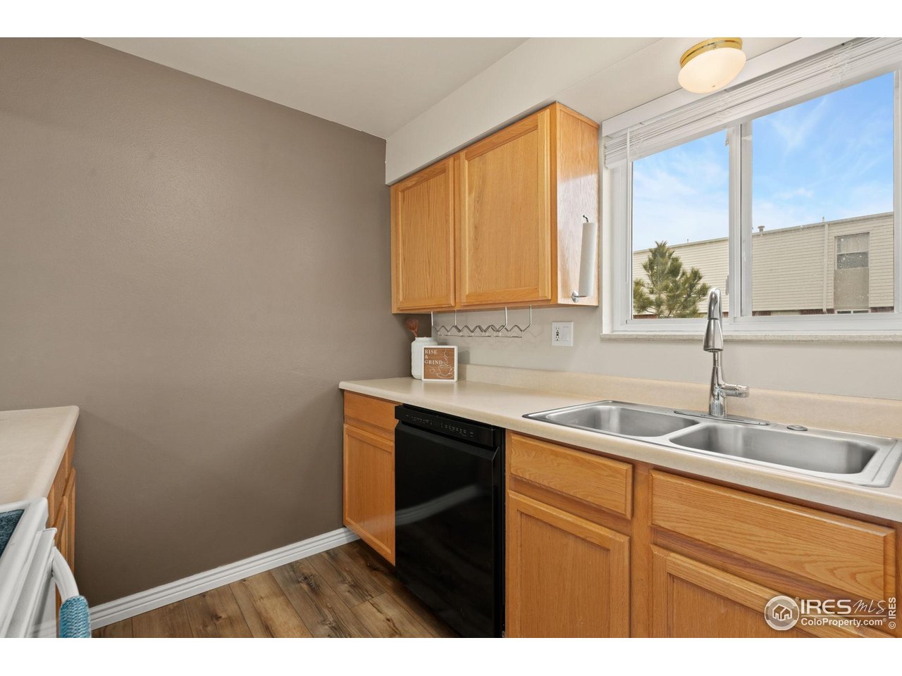 707 3rd Street, Unit 5 Windsor, CO 80550 - Photo 6 of 18 a bathroom with a sink and a mirror