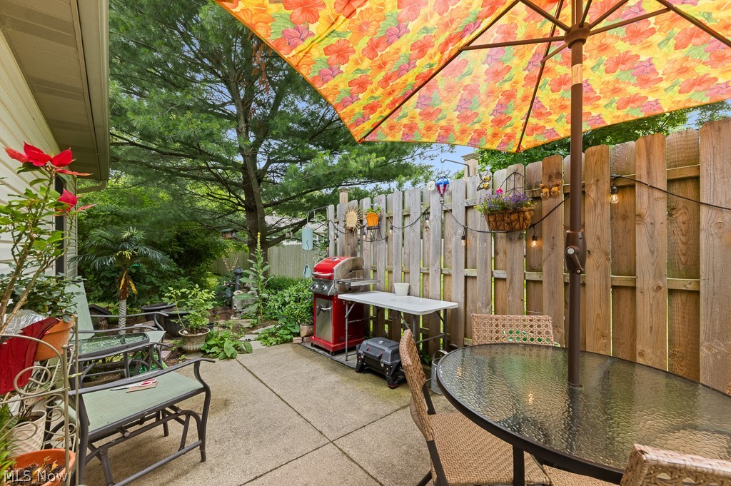 808 Ryan Road, Unit 14 Medina, OH 44256 - Photo 29 of 40 Outdoor patio featuring a concrete surface and a wooden privacy fence