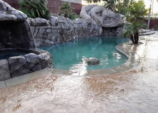 a view of staircase with white walls and a window