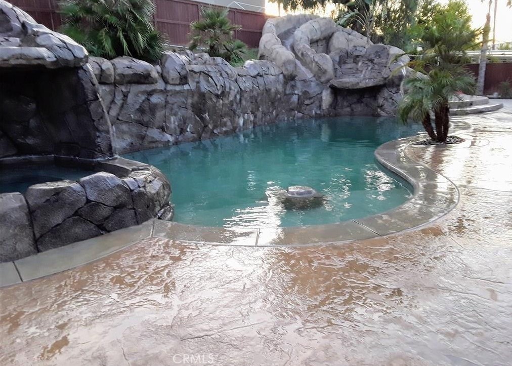 12701 Palm View Way Riverside, CA 92503 - Photo 11 of 26 a backyard of a house with lots of green space