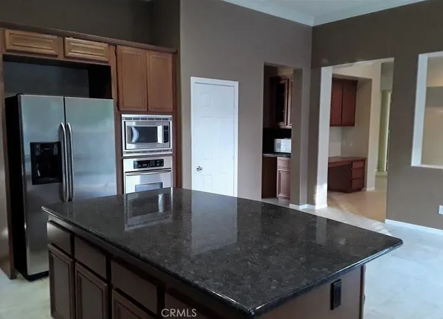a view of a kitchen counter top of a kitchen