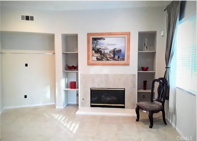 a view of a living room with a large window