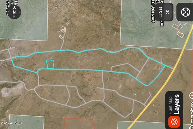 a view of a road with an ocean view