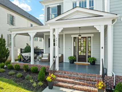 a view of a house with a porch