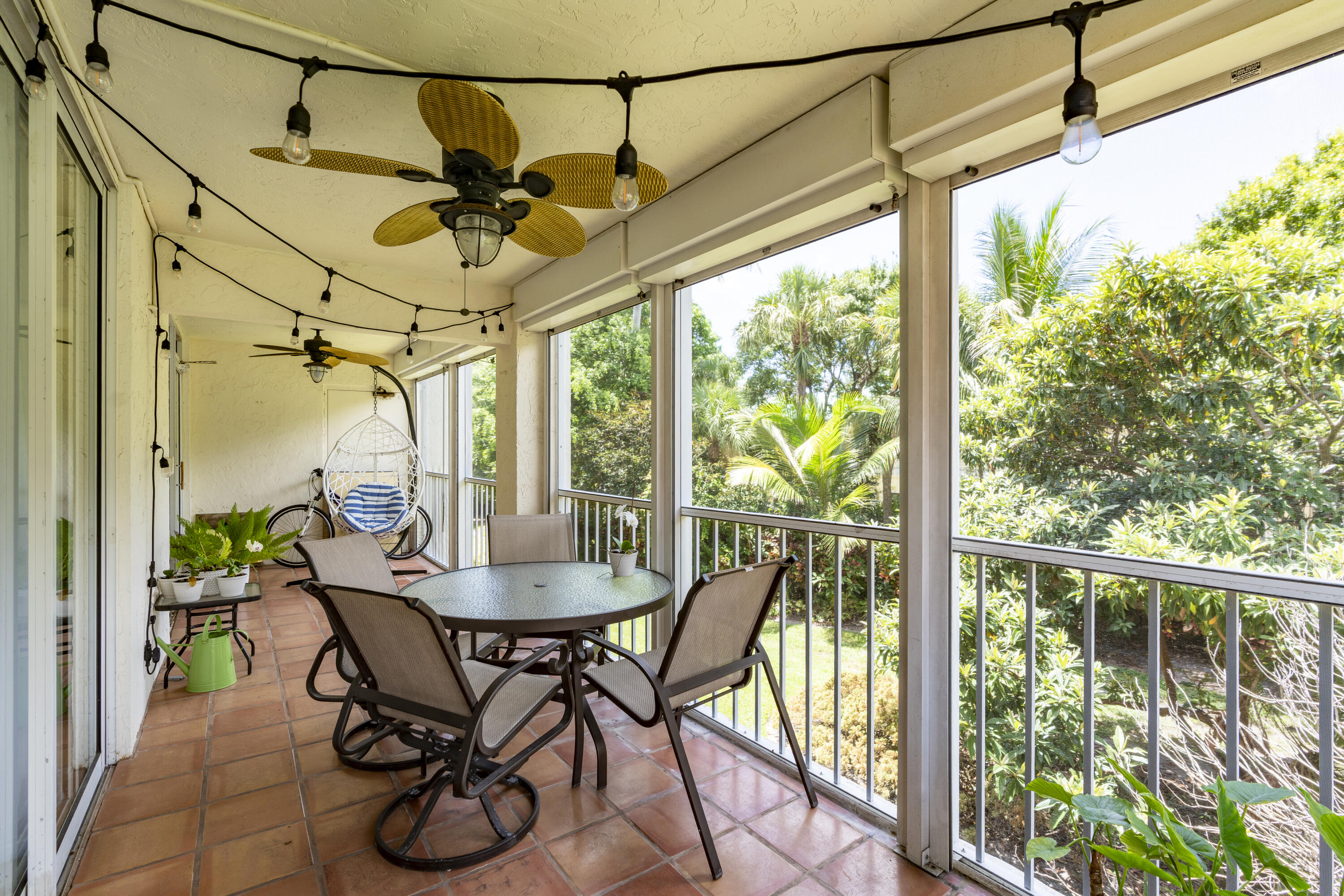 106 Half Moon Circle, Unit H2 Hypoluxo, FL 33462 - Photo 35 of 70 a view of an outdoor space with furniture