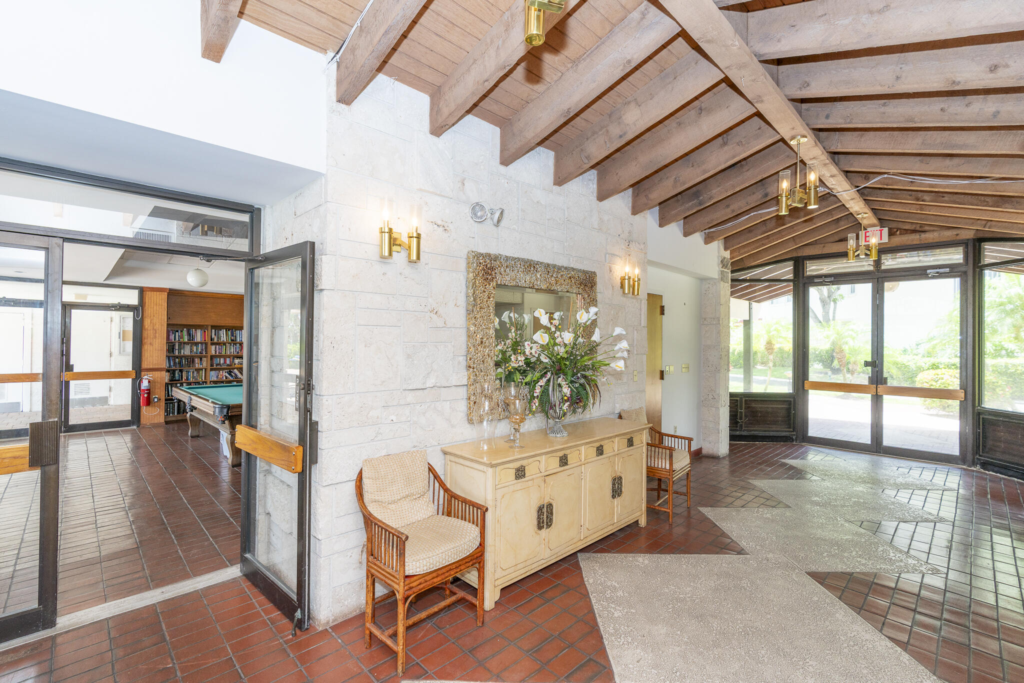 106 Half Moon Circle, Unit H2 Hypoluxo, FL 33462 - Photo 52 of 70 a dining room with furniture and a large window