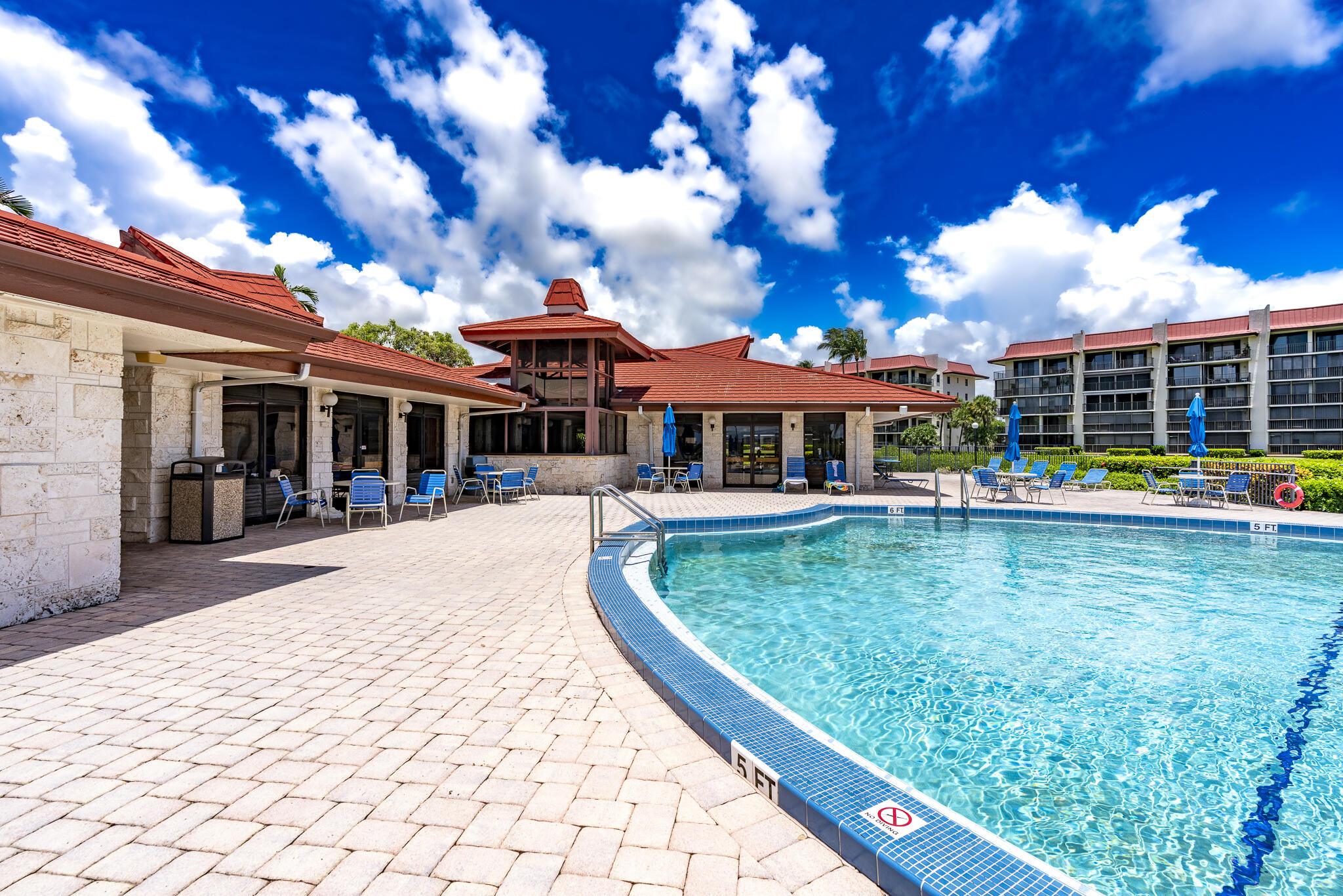 106 Half Moon Circle, Unit H2 Hypoluxo, FL 33462 - Photo 66 of 70 a view of a house with a swimming pool