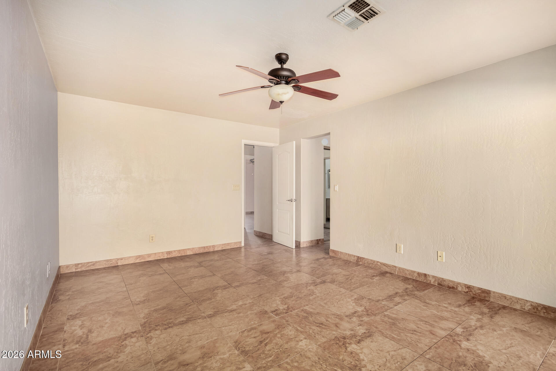 9152 West Redfield Road Peoria, AZ 85381 - Photo 12 of 21 a view of an empty room