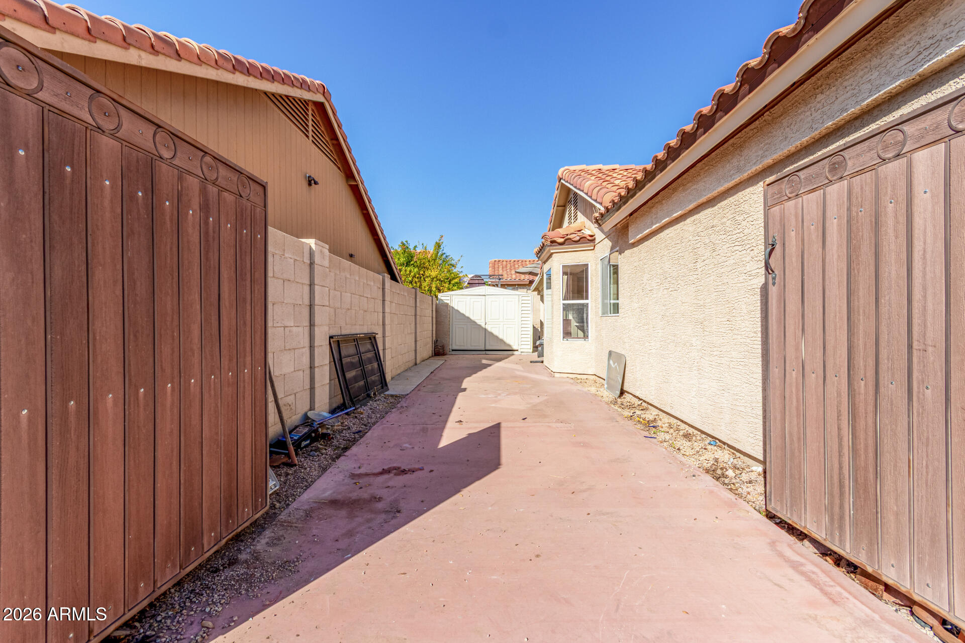 9152 West Redfield Road Peoria, AZ 85381 - Photo 18 of 21 a view of a house with backyard and deck