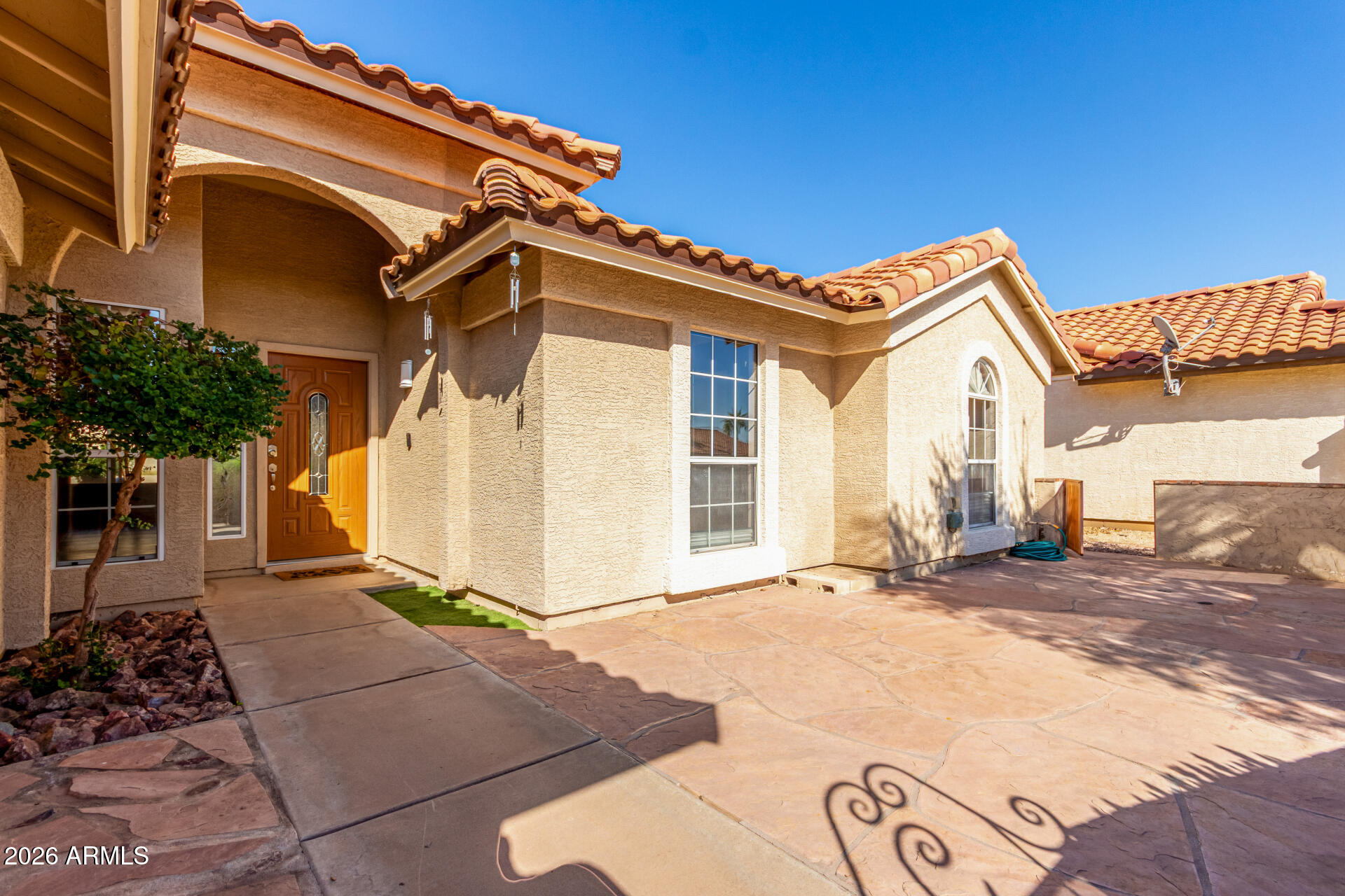 9152 West Redfield Road Peoria, AZ 85381 - Photo 20 of 21 a view of a house with a patio