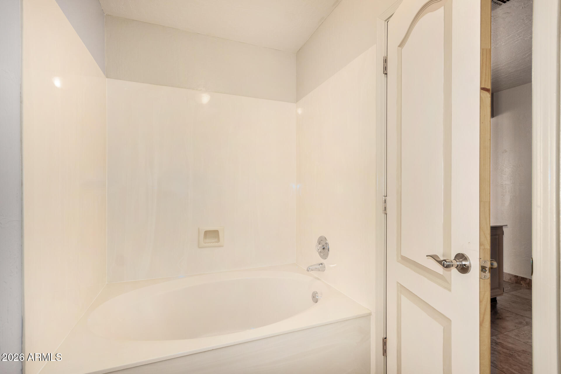 9152 West Redfield Road Peoria, AZ 85381 - Photo 9 of 21 a close up of a bathtub