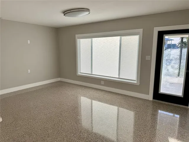 an empty room with a window