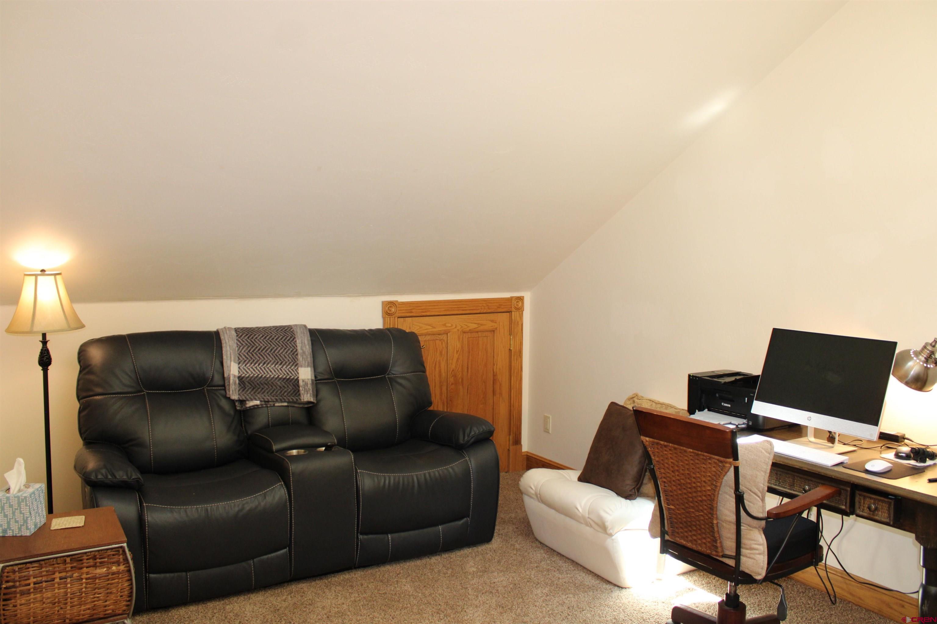 28 Holly Tree Circle Pagosa Springs, CO 81147 - Photo 17 of 27 a living room with furniture