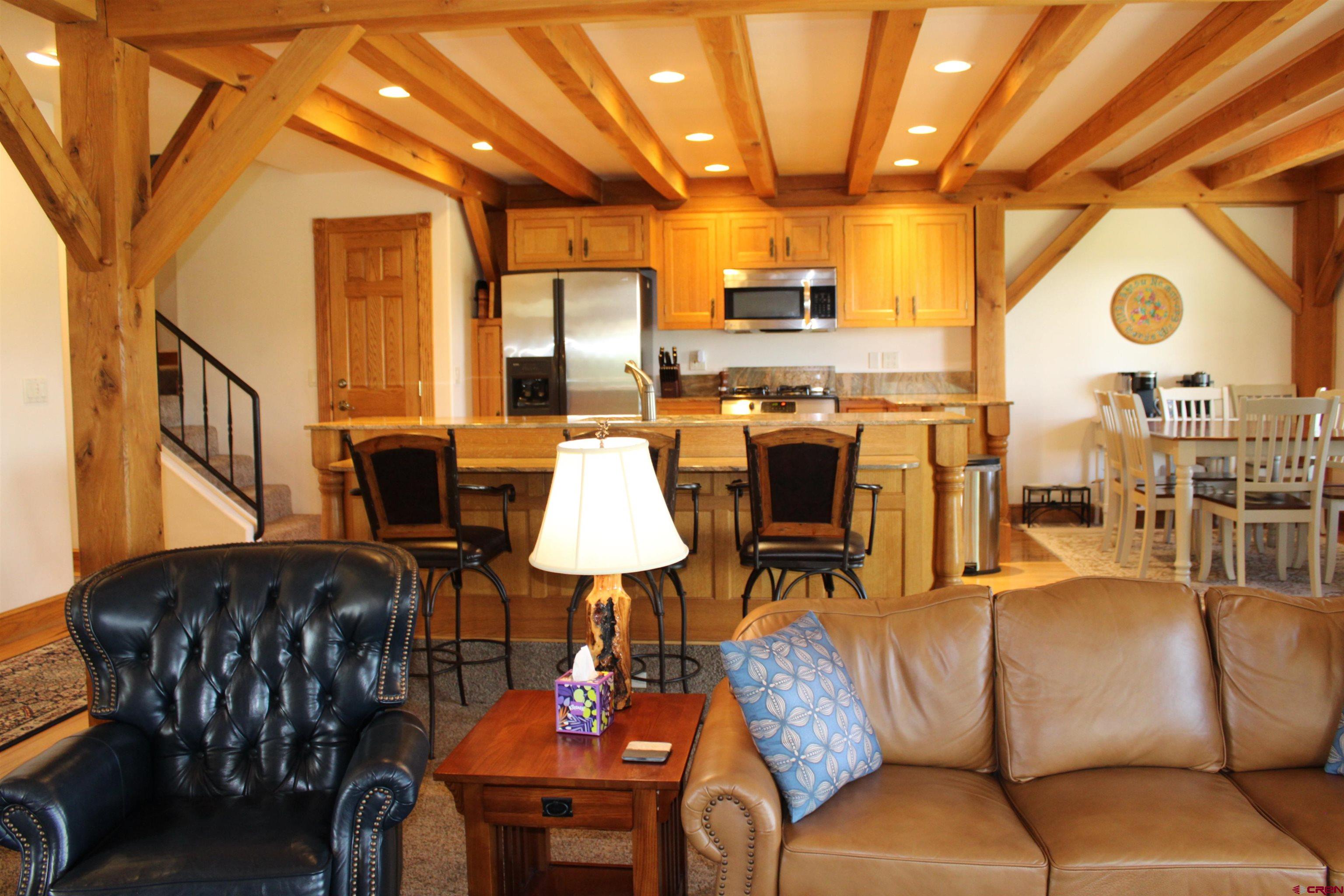 28 Holly Tree Circle Pagosa Springs, CO 81147 - Photo 4 of 27 a living room with furniture and wooden floor