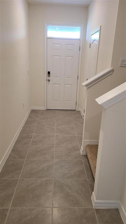 1310 Mako Way Kissimmee, FL 34741 - Photo 14 of 26 a bathroom with a shower